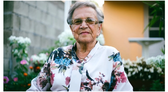 Older lady in a flowery blouse